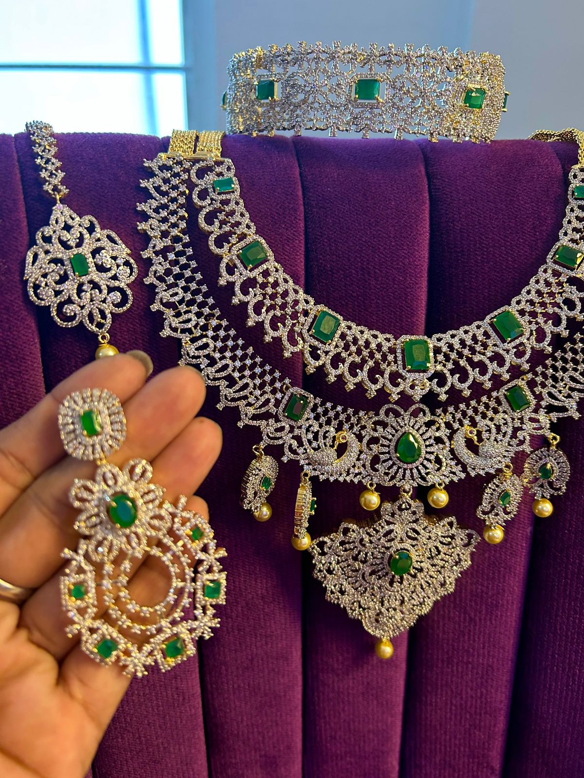 Super grand luxury diamond set , southindain neckband with big earrings , tikka and diamond nath