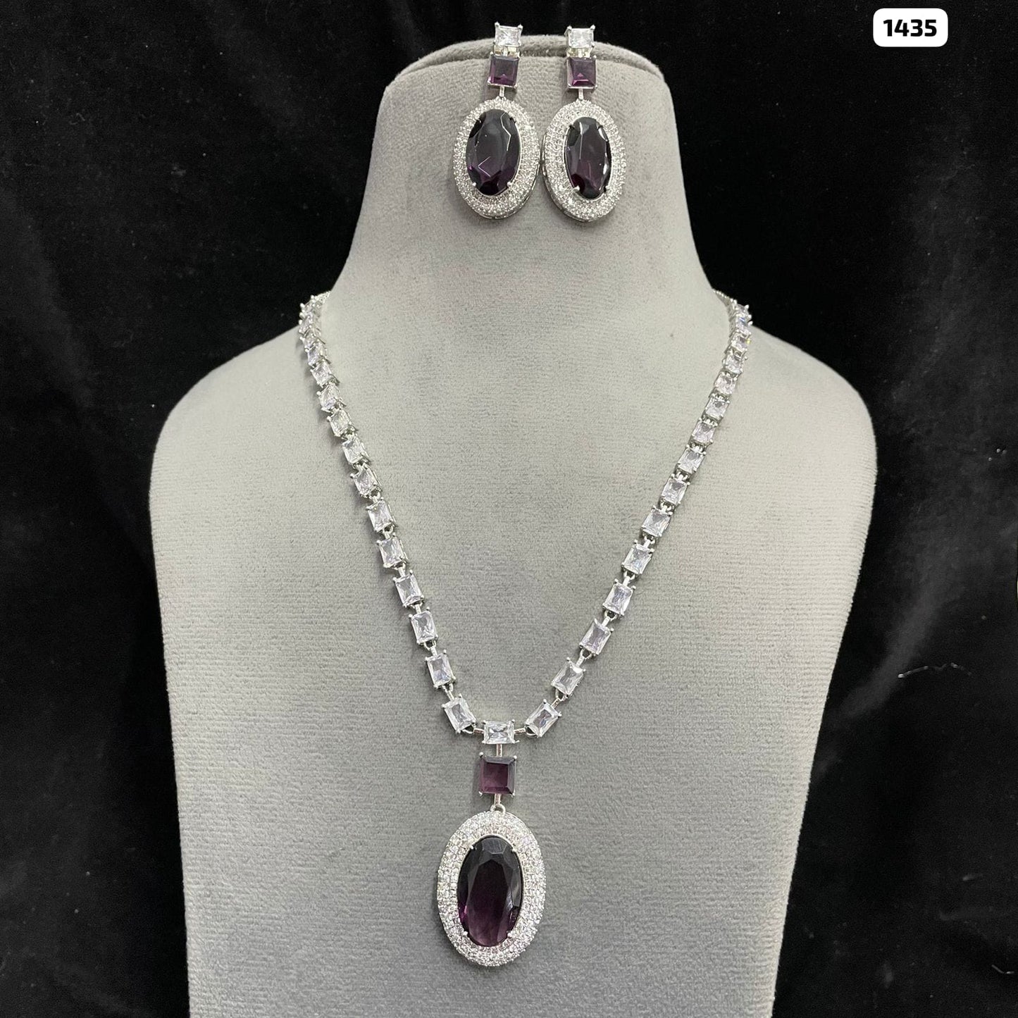 Elegant AD Pendant with Matching Earrings Ensemble