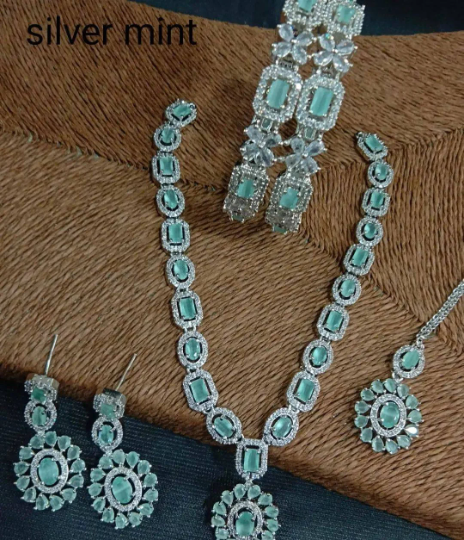 Resplendent Vintage Glamour: American Diamond Necklace Set with Earrings, Maangtikka, and Bangles from a Bygone Era