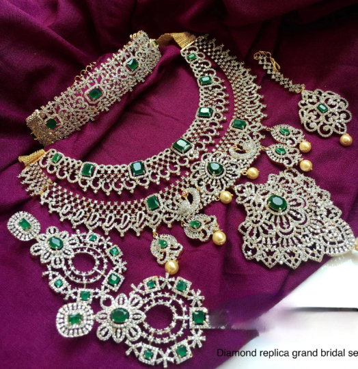 Super grand luxury diamond set , southindain neckband with big earrings , tikka and diamond nath