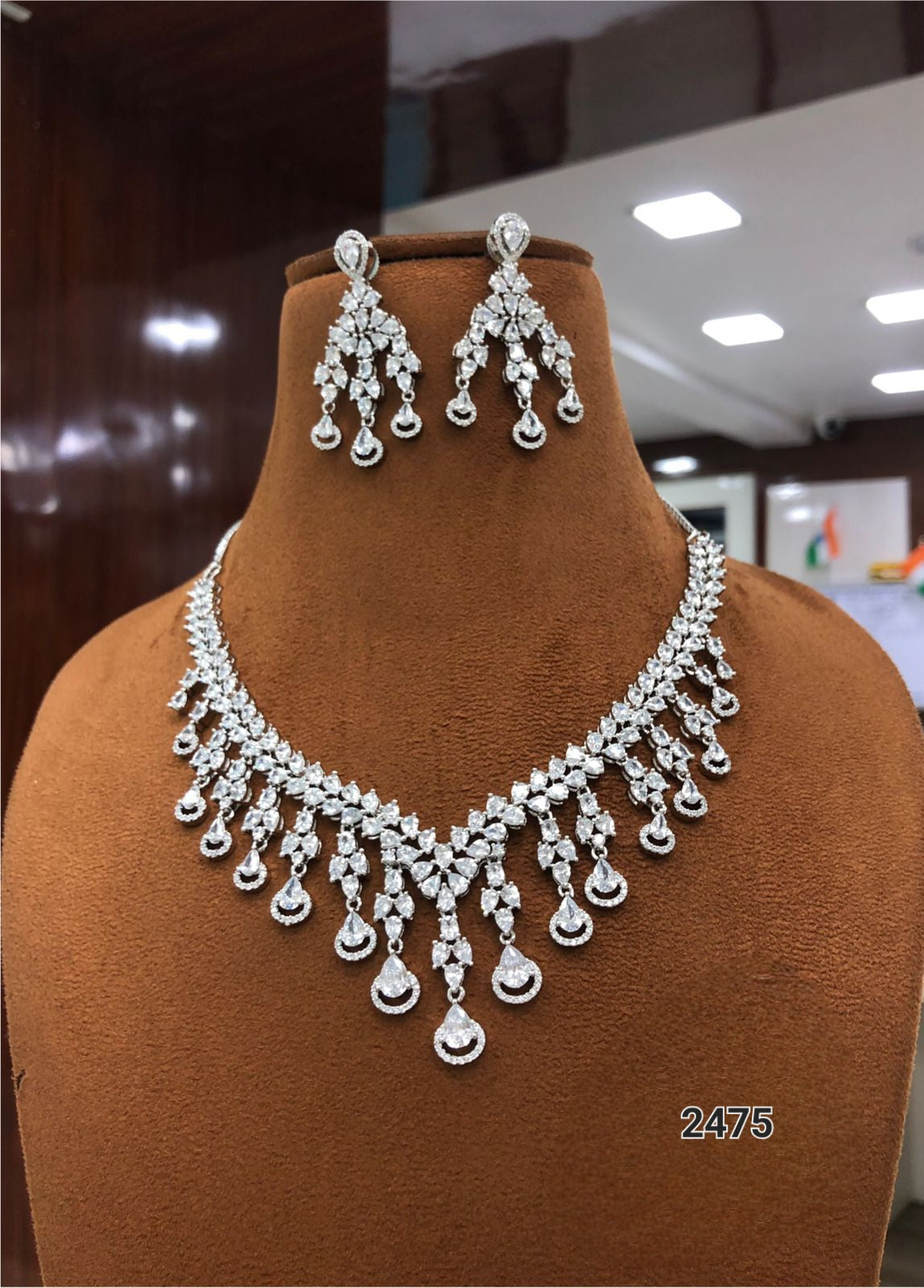 Radiant Elegance: The American Diamond Necklace and Earring Set by Sagunittujewel