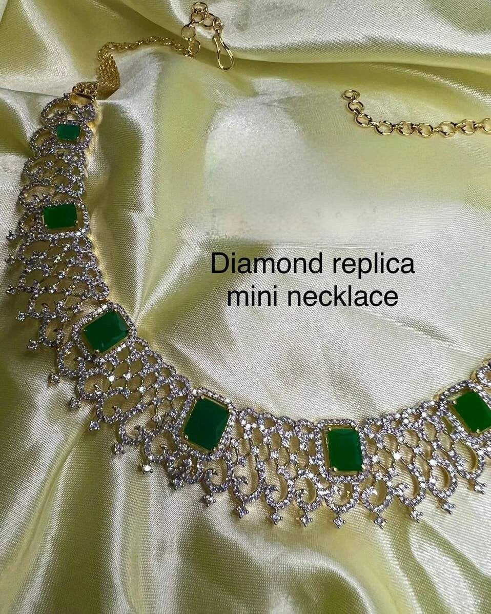 Handcrafted Diamond, Emerald, and Ruby Choker Set with Exquisite Jhumka Earrings