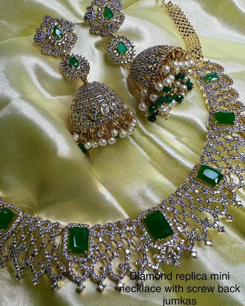 Handcrafted Diamond, Emerald, and Ruby Choker Set with Exquisite Jhumka Earrings
