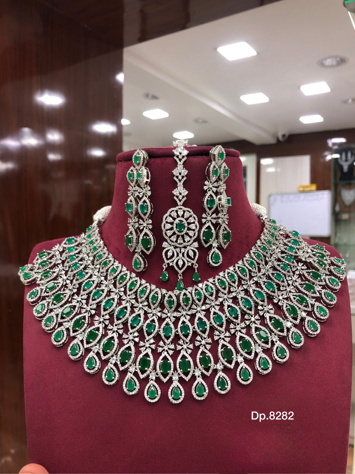 High Quality American diamond Full-bridal Necklace With Earrings and Maangtikka available in green / baby pink on silver polished