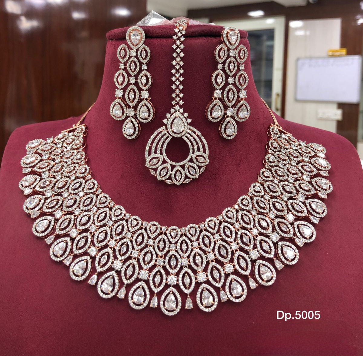 High Quality American diamond Full-bridal Necklace With Earrings and Maangtikka available in silver on rose gold polished/  green on silver polished