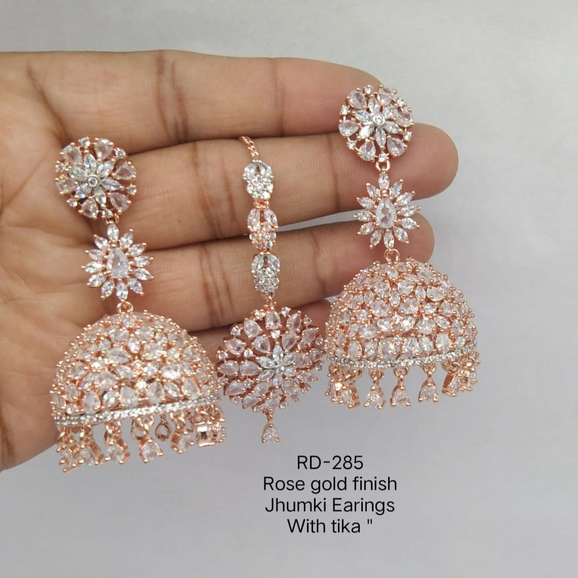 Adorn Yourself with Exquisite Long Jhumka Earrings and Maang Tikka Jewelry