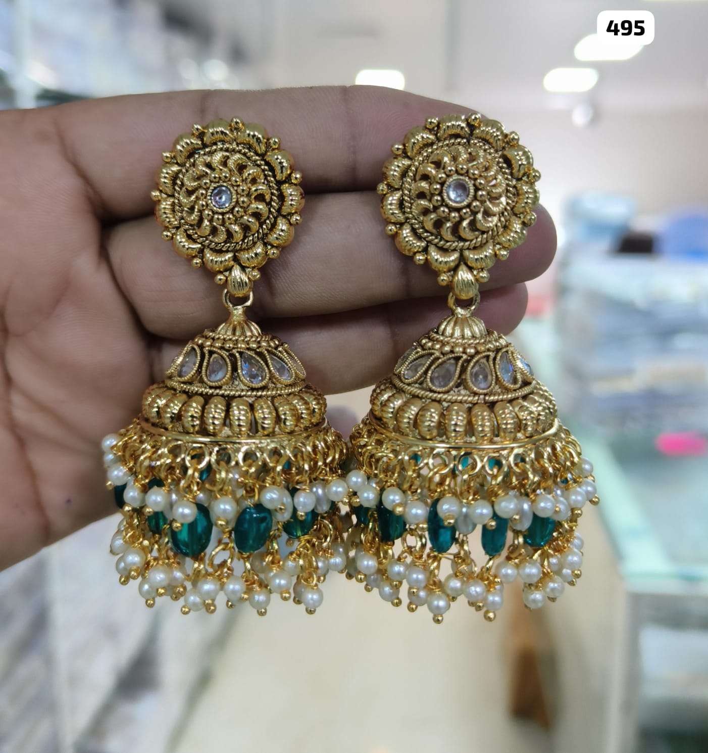 Radiant Elegance: Gold-Plated Jhumka Jewelry Collection