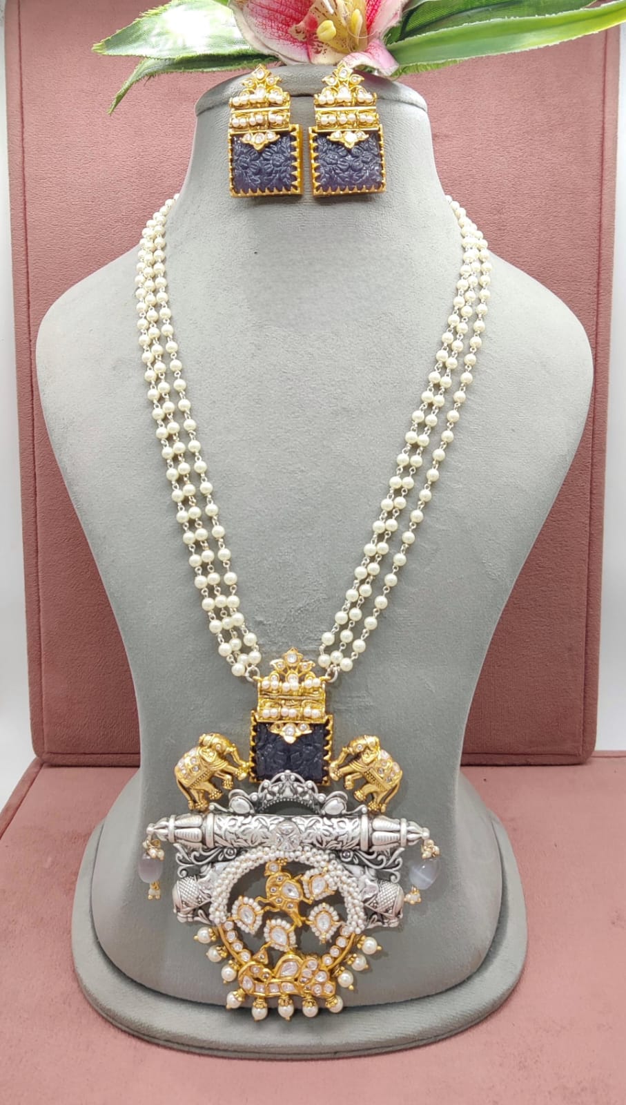 Harmony in Pearls: Multi-String Haram Necklace with Silver and Gold Polished Pendant Earrings