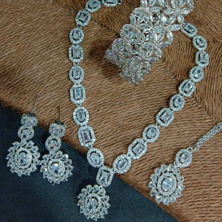 Resplendent Vintage Glamour: American Diamond Necklace Set with Earrings, Maangtikka, and Bangles from a Bygone Era