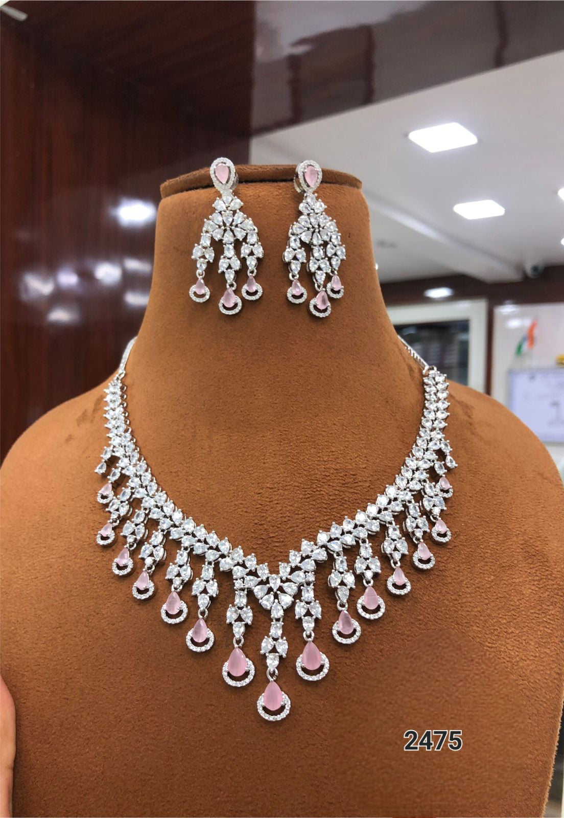 Radiant Elegance: The American Diamond Necklace and Earring Set by Sagunittujewel