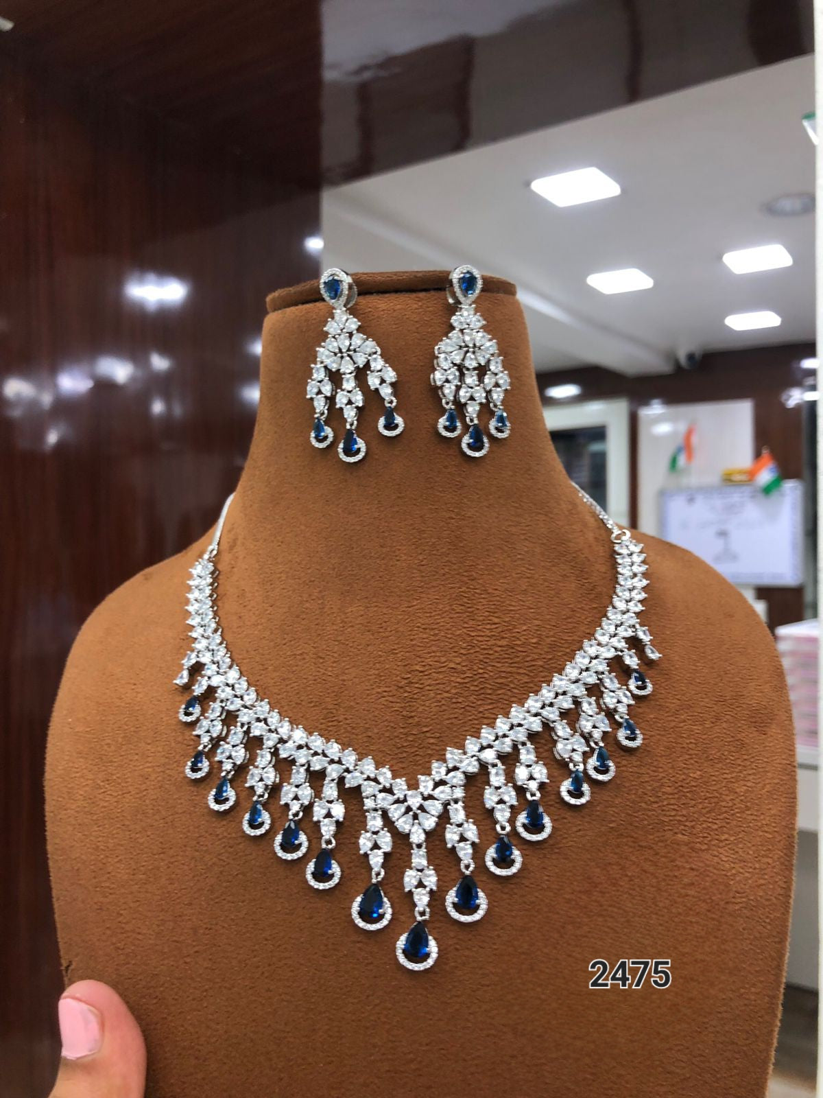 Radiant Elegance: The American Diamond Necklace and Earring Set by Sagunittujewel